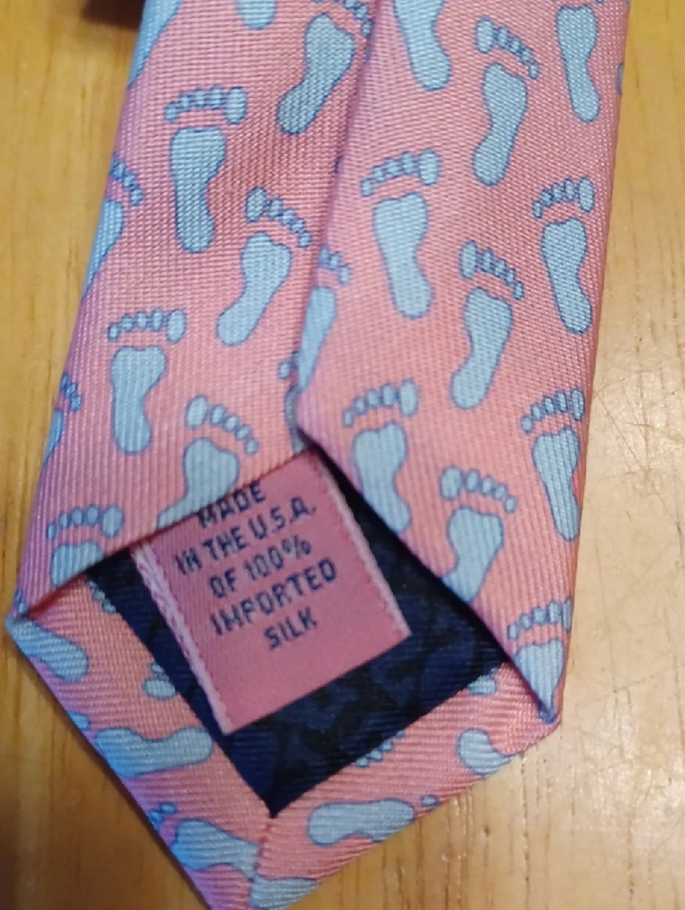 Vineyard Vines Pink Tie with Light Blue Footprint Print 100% Silk